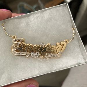 Jennifer nameplate necklace.